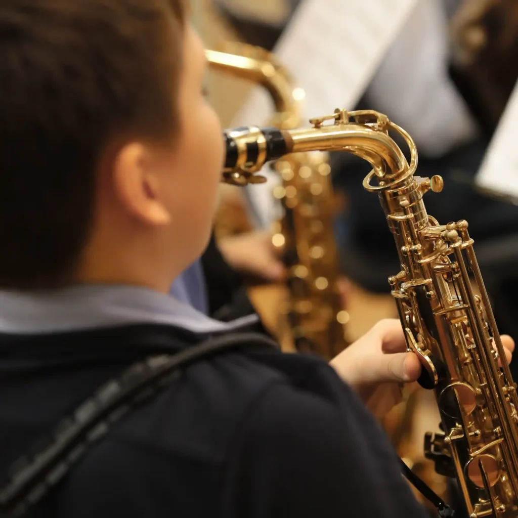 Young Boy Playing Saxophone